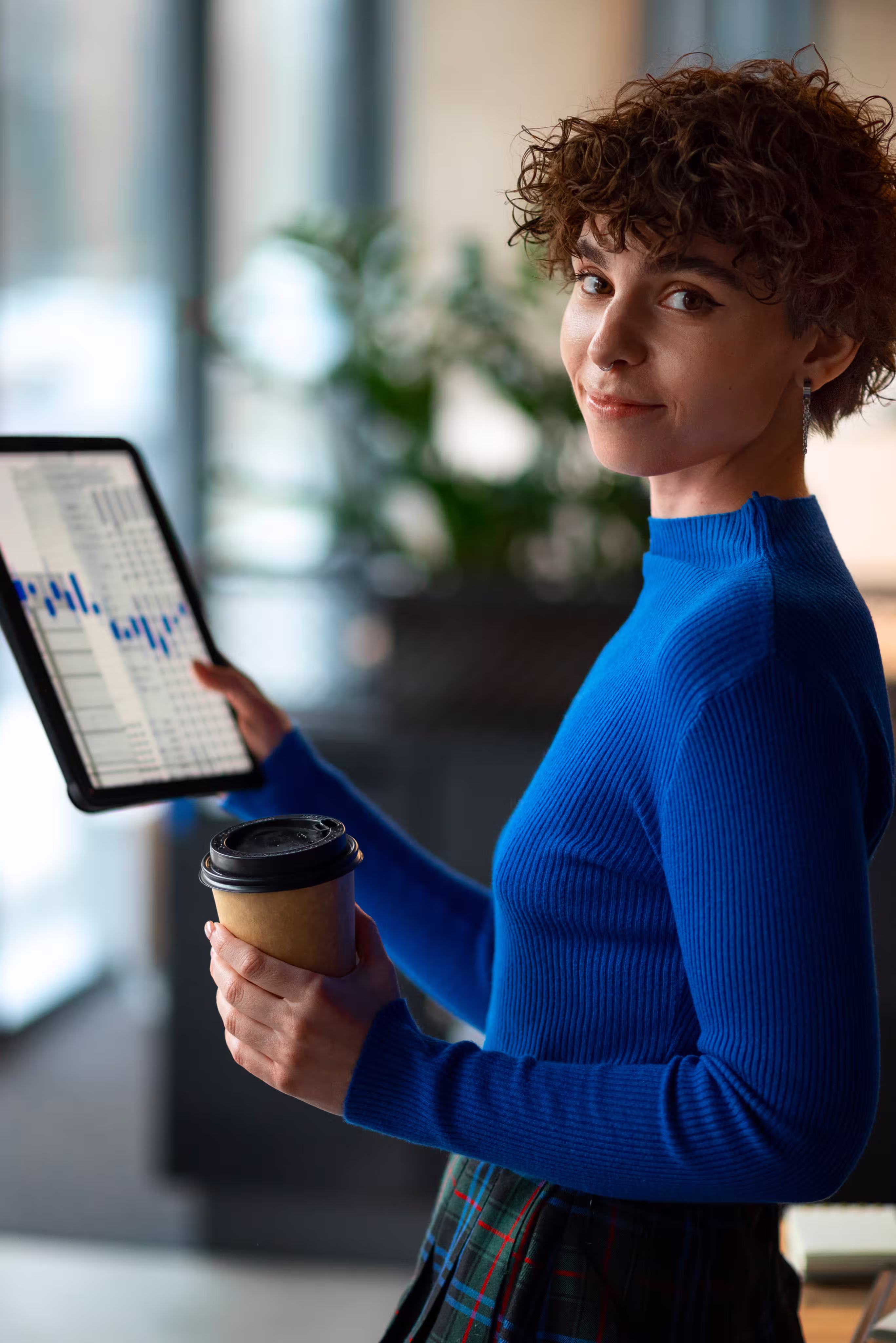 Person presenting data on a tablet screen